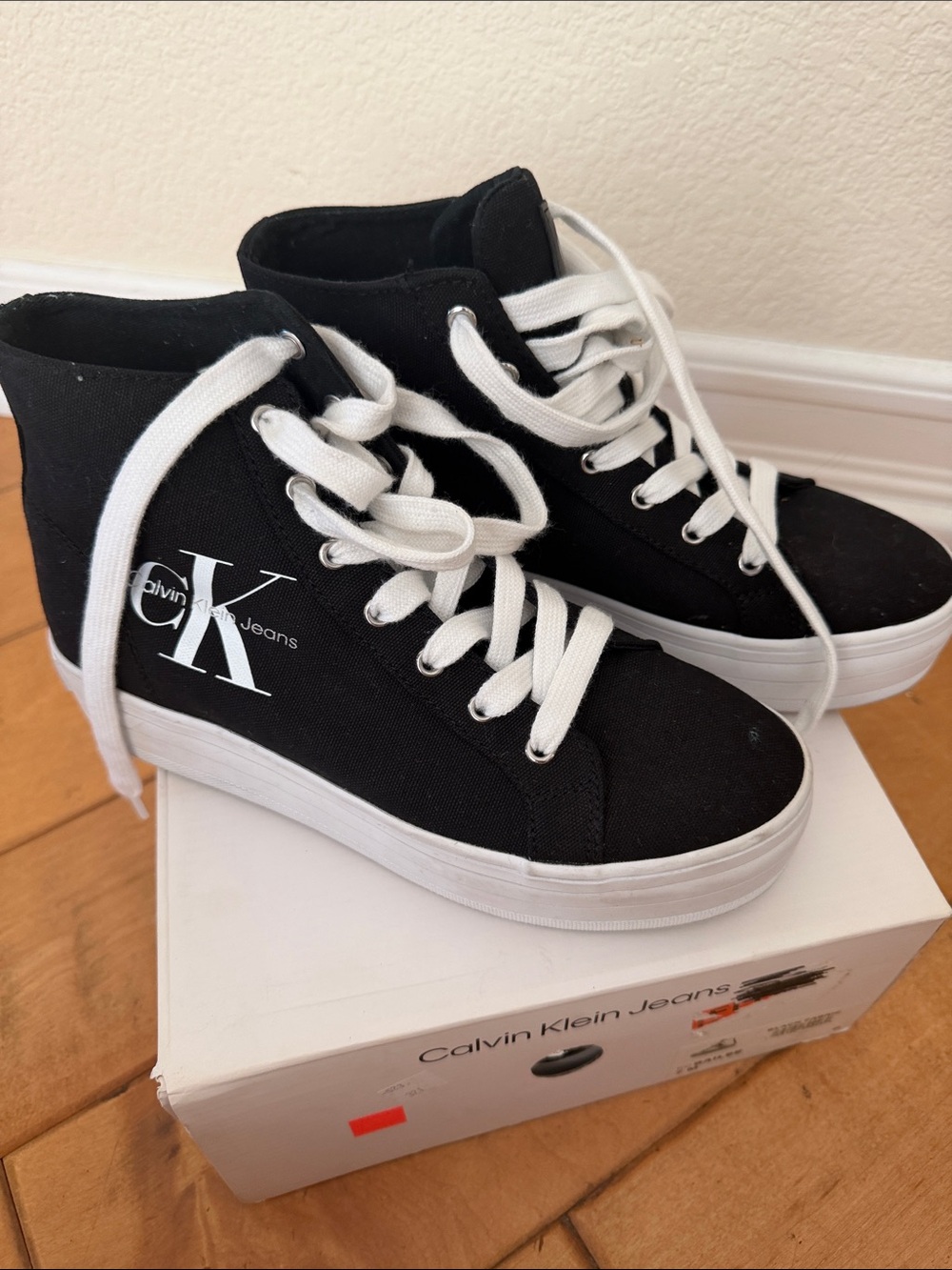 Calvin Klein Black and White High-Top Canvas Sneakers